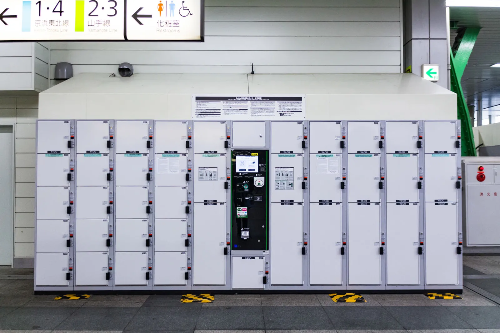 A row of IC-card coin lockers in a station passage